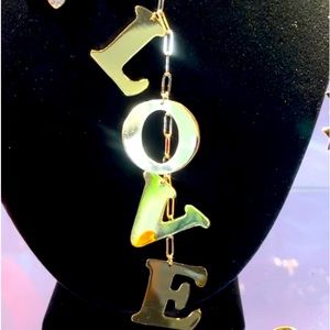 Love necklace on paperclip chain approx 34” adjustable to make shorter to 28”